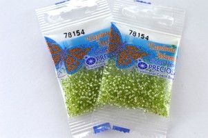 Бисер чешский Preciosa, цв.78154 салатовый, 10/0, круглый прозрачный серебряная линия внутри, 5 гр
