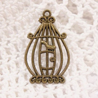 Металлическая подвеска Круглая клетка с птичкой, 33х20 мм, бронза